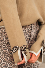 Load image into Gallery viewer, Tan Leopard Bow Decor Split Cuff Contrast Trim Sweater
